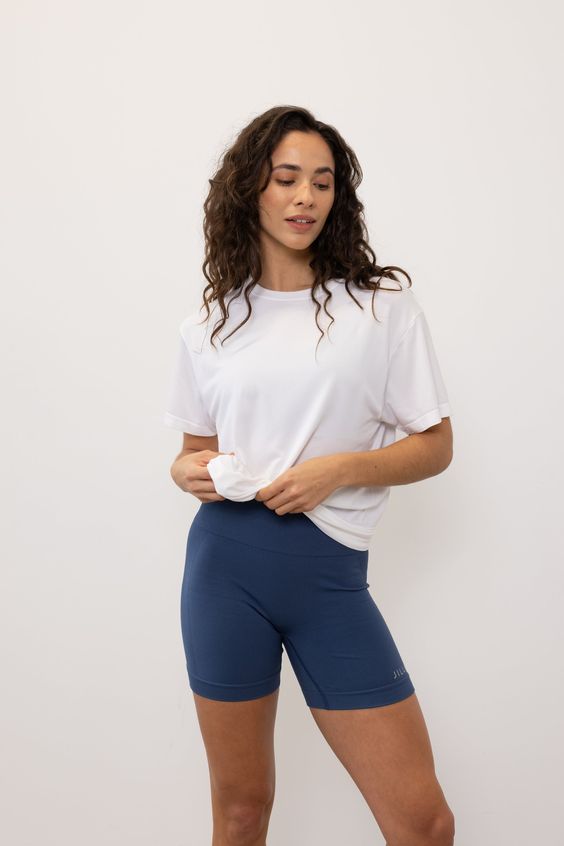 oversized t-shirts white with blue bike shorts