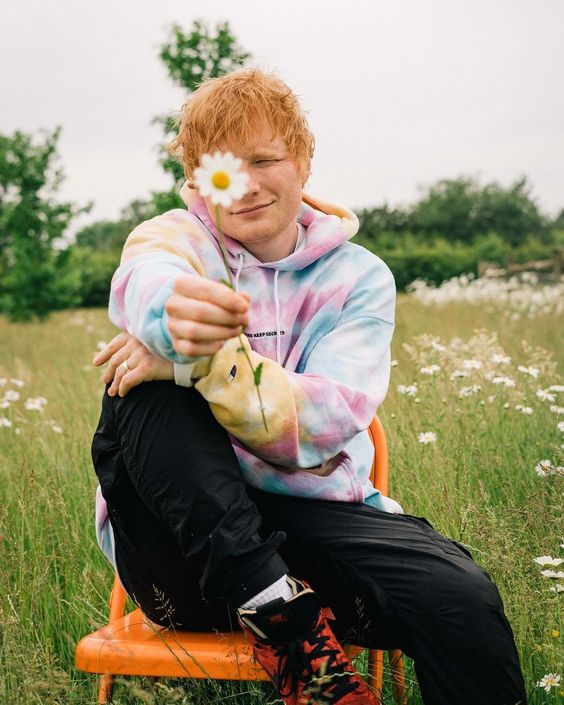 Ed Sheeran hoodie with sneakers and boots