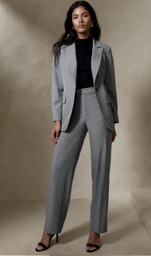petite woman in gray power suit