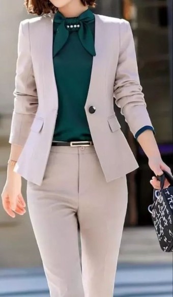 petite woman in beige power suit