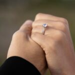 perfect gold engagement rings holding hands