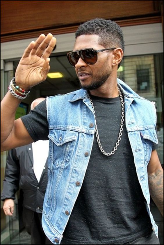 Guy wearing jean jacket with cutoff sleeves