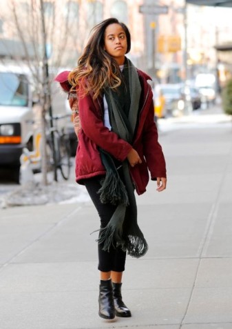 Malia Obama in capri pants, maroon jacket, and scarf