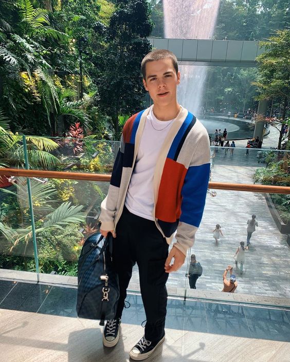 Aaron Fredrick Mitchell aka AJ Mitchell wearing chains