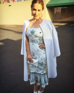 dazzling in white Emilia Clarke dress