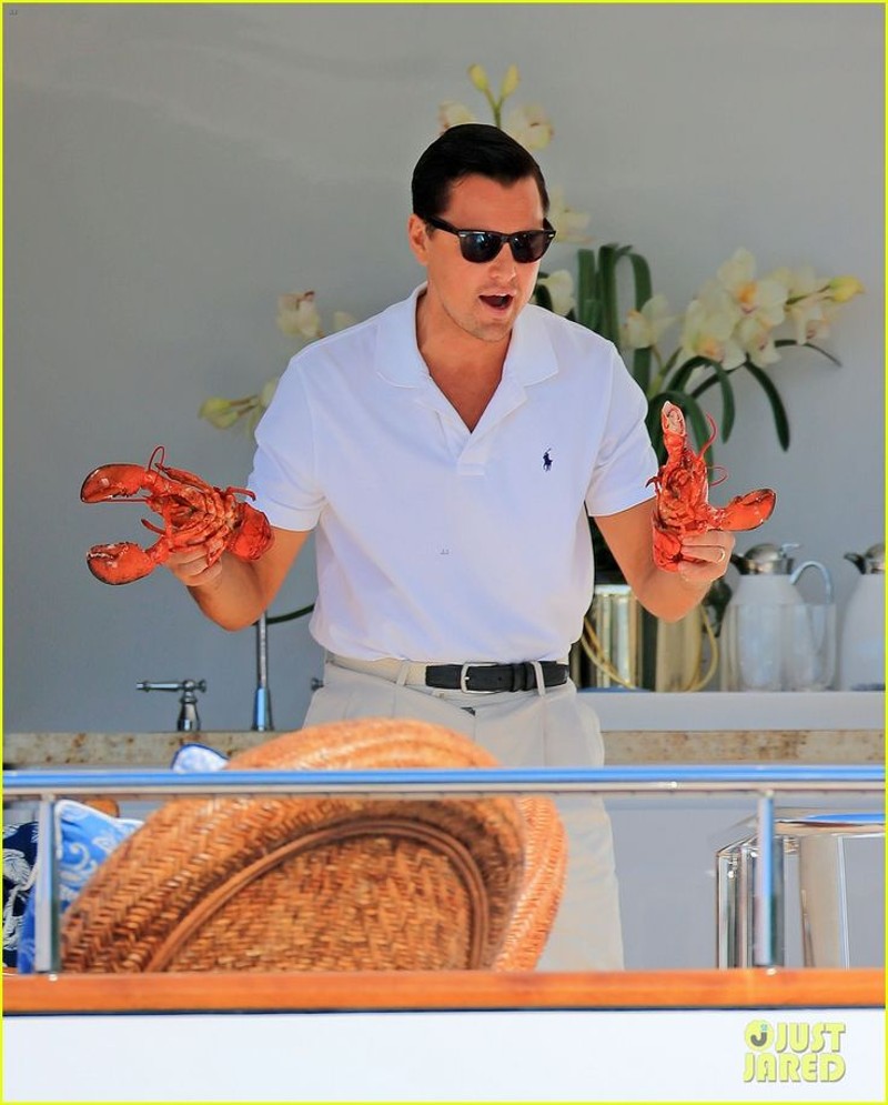 Rock Leonardo DiCaprio Ray-Ban Wayfarer holding 2 lobsters