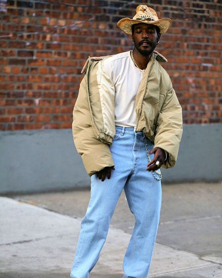 Luke James with straw hat