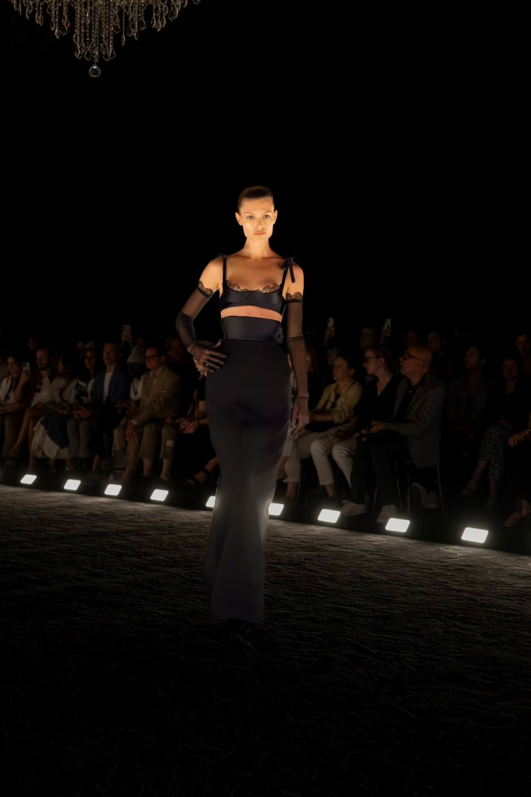 Mikey Madison attended the 2024 Gotham Awards in a long skirt, bra top, and long gloves inspired by Schiaparelli Haute Couture’s Fall/Winter 2024/2025 collection