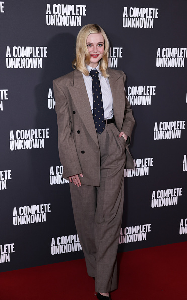 Elle Fanning in Saint Laurent gray suit