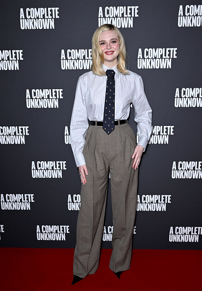 Elle Fanning in Saint Laurent gray suit no blazer