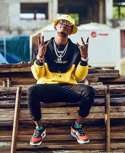 Shatta Wale in yellow hat