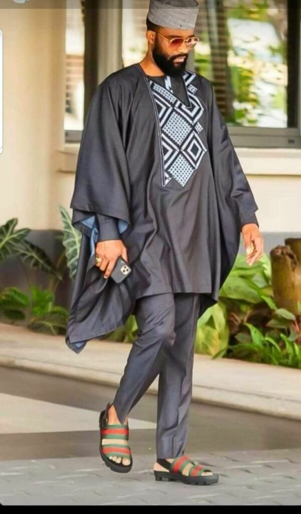 Fally Ipupa in black and white cultural outfit 