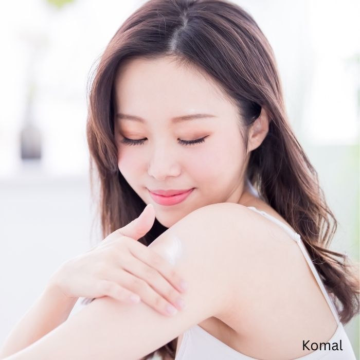 body care routine woman applying lotion