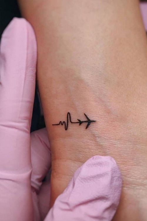Tattoo trends jet with swiggle tail
