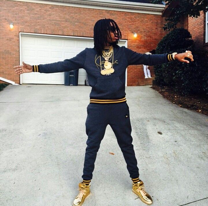 Quavo with arms out