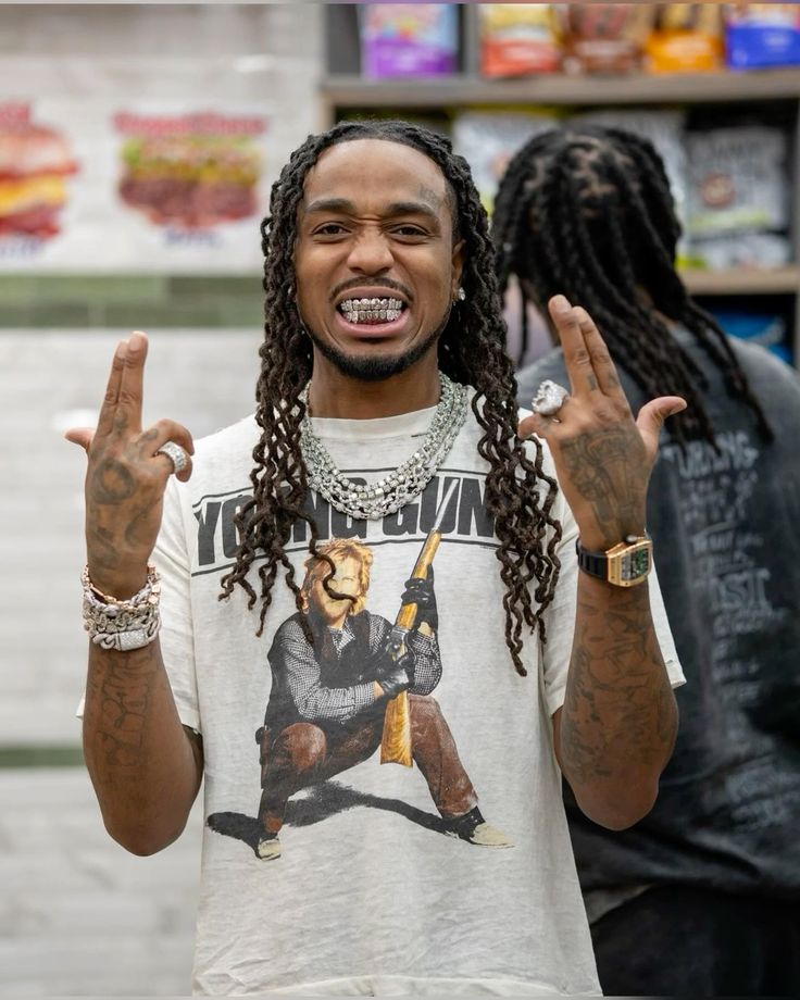 Quavo silver teeth