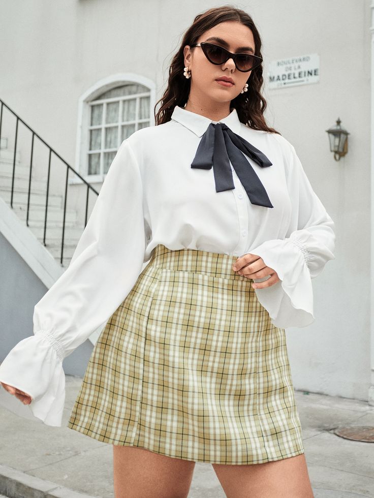 Get your teeth into a High-Waisted Skirt with Tie-Neck Blouses