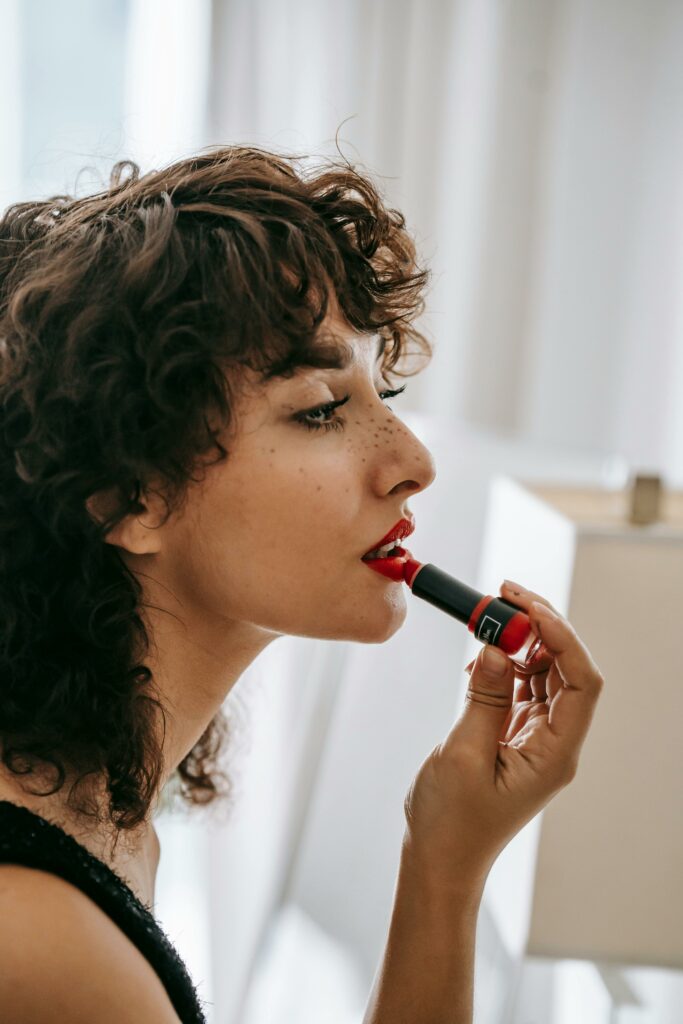 top 10 lip balms woman applying red
