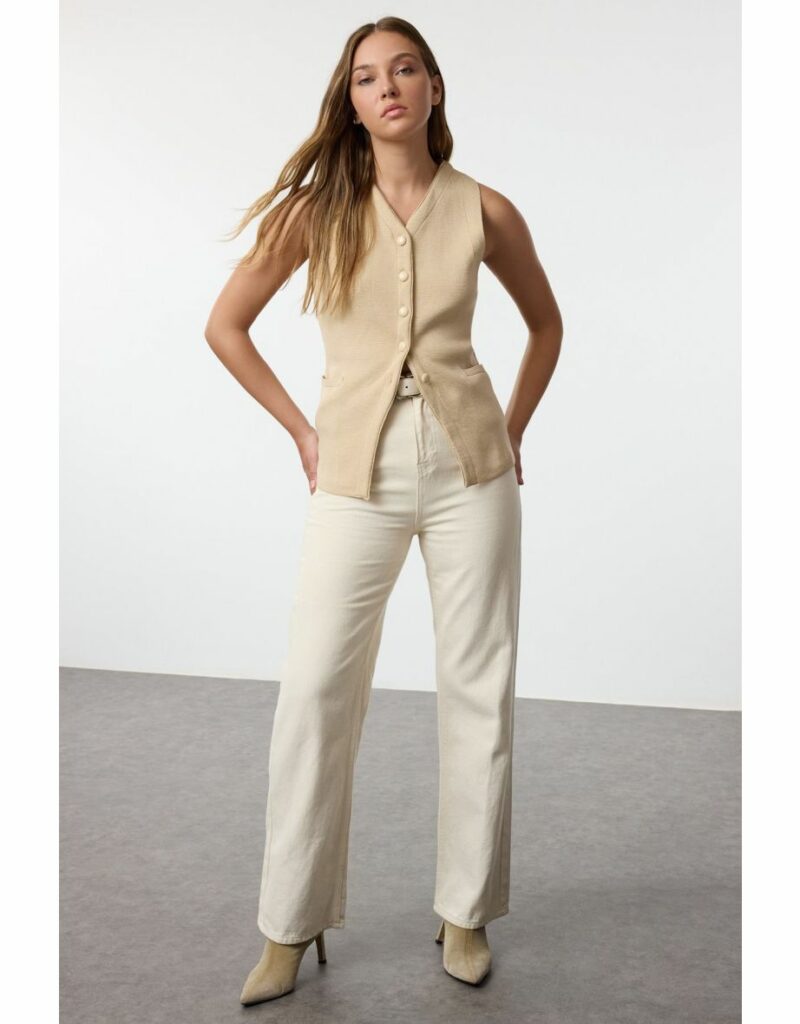 age-defying woman in biege top 