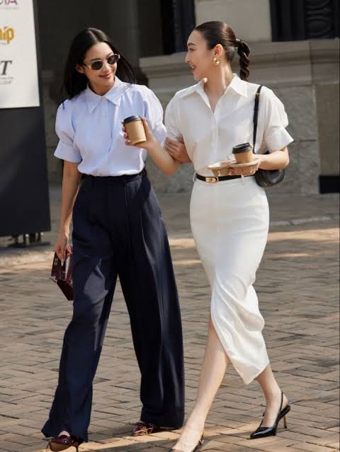 top petite fashion brands two girls walking carrying coffee