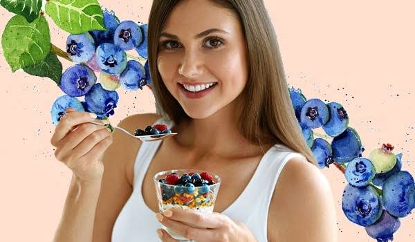 girl with radiant skin eating fruit