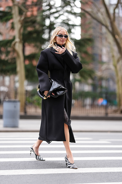 Leonie Hanne at New York Fashion Week black wool coat