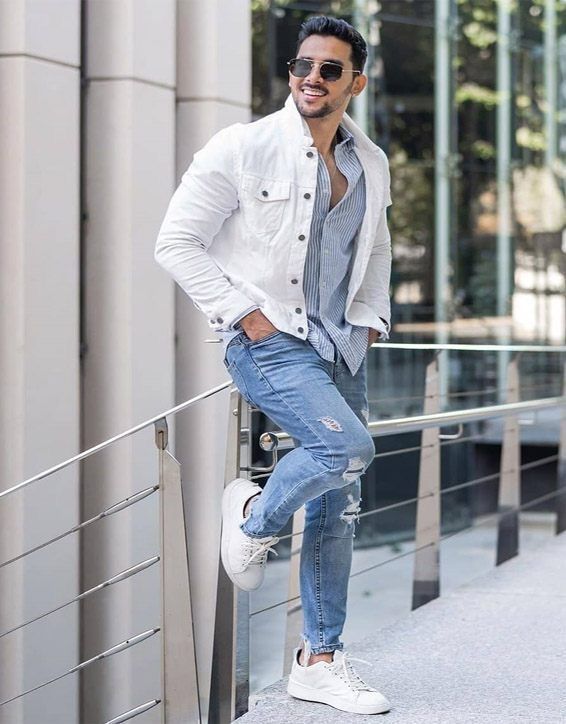 man wearing white denim jacket outfit