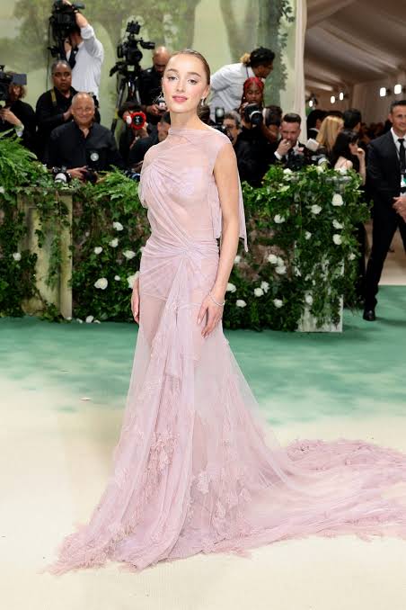 actress wearing pink transparent fabrics