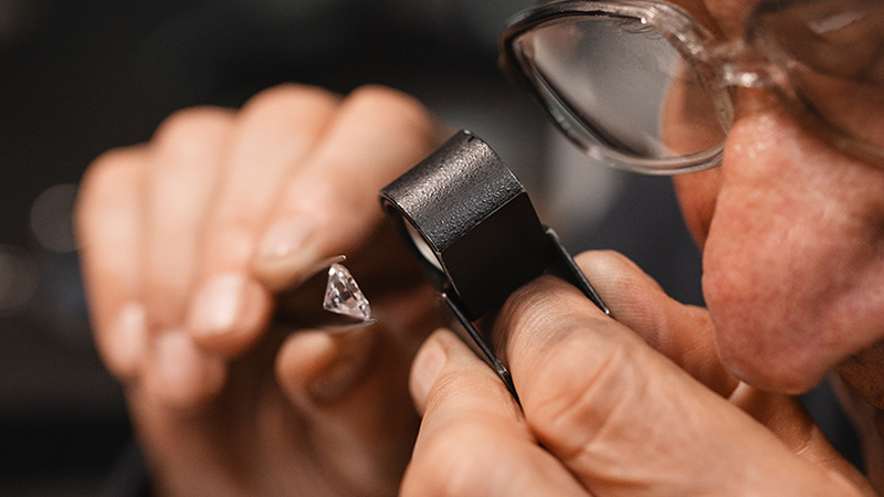 lab diamonds jeweler inspecting diamond