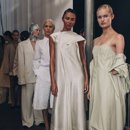 Group of women wearing white  Scandi Chic