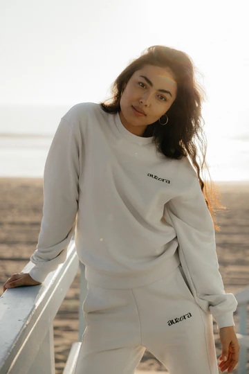 luxury loungewear girl in white sweats