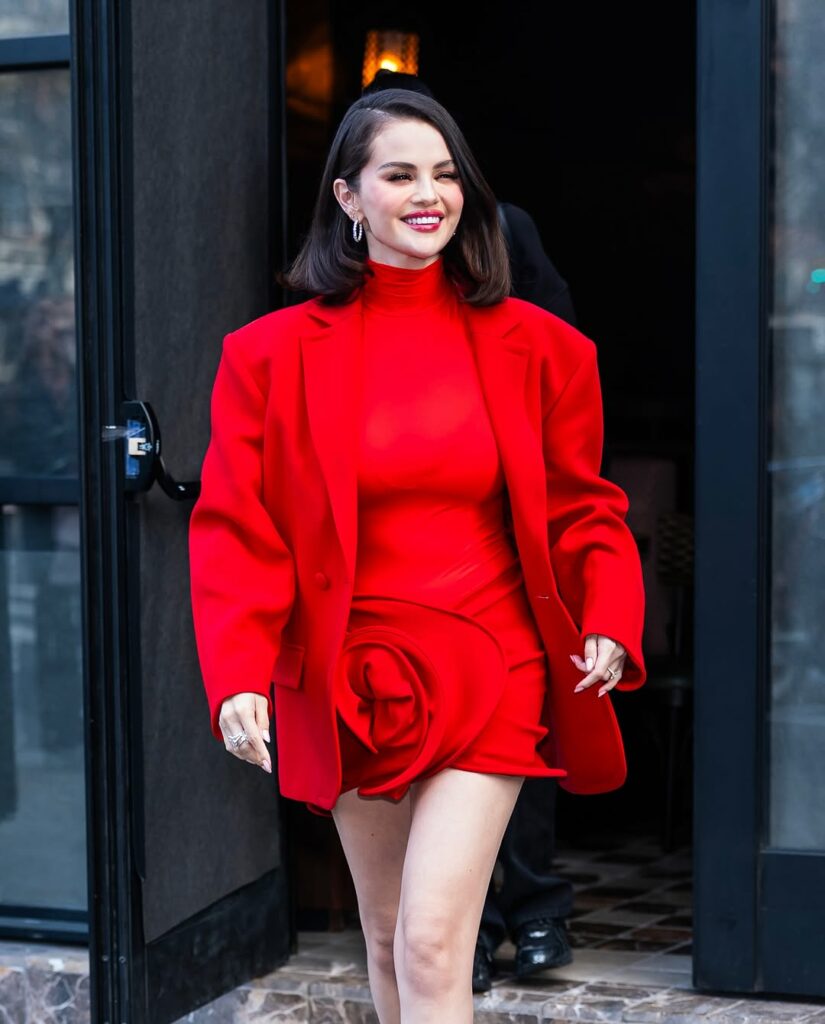 Selena Gomez in Magda Butrym crimson suit walking