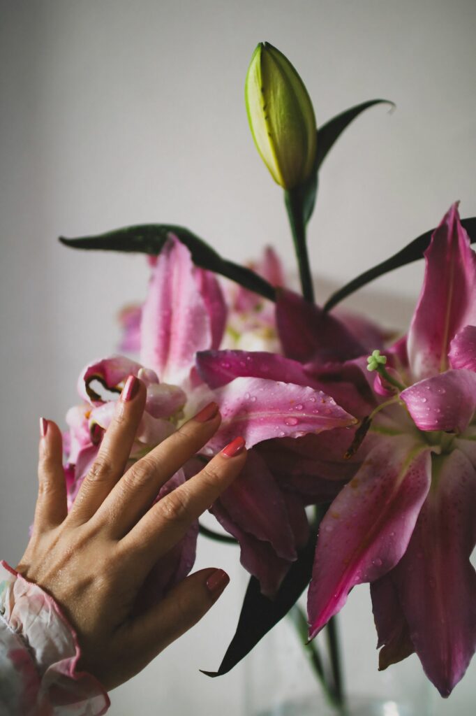 nails in deep pink Orly Nail Polish