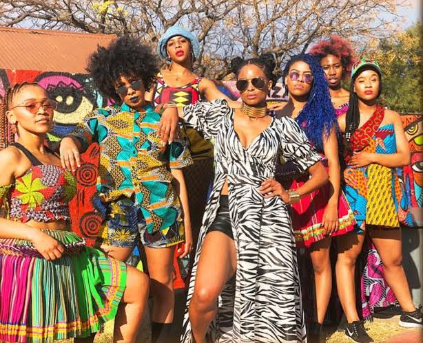 global influences on fashion models in bright colors