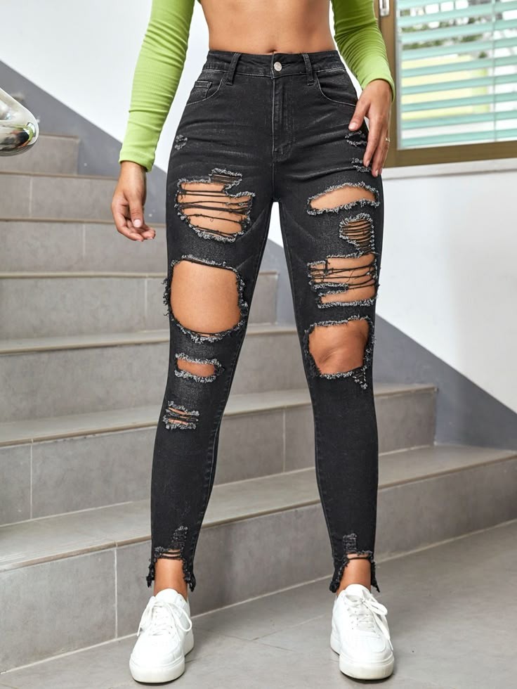 black ripped jeans with green crop top 