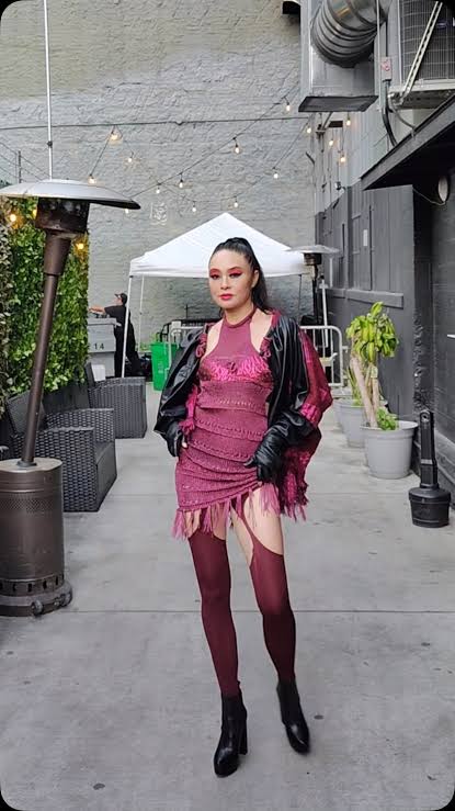 style choices model in tacky red outfit 