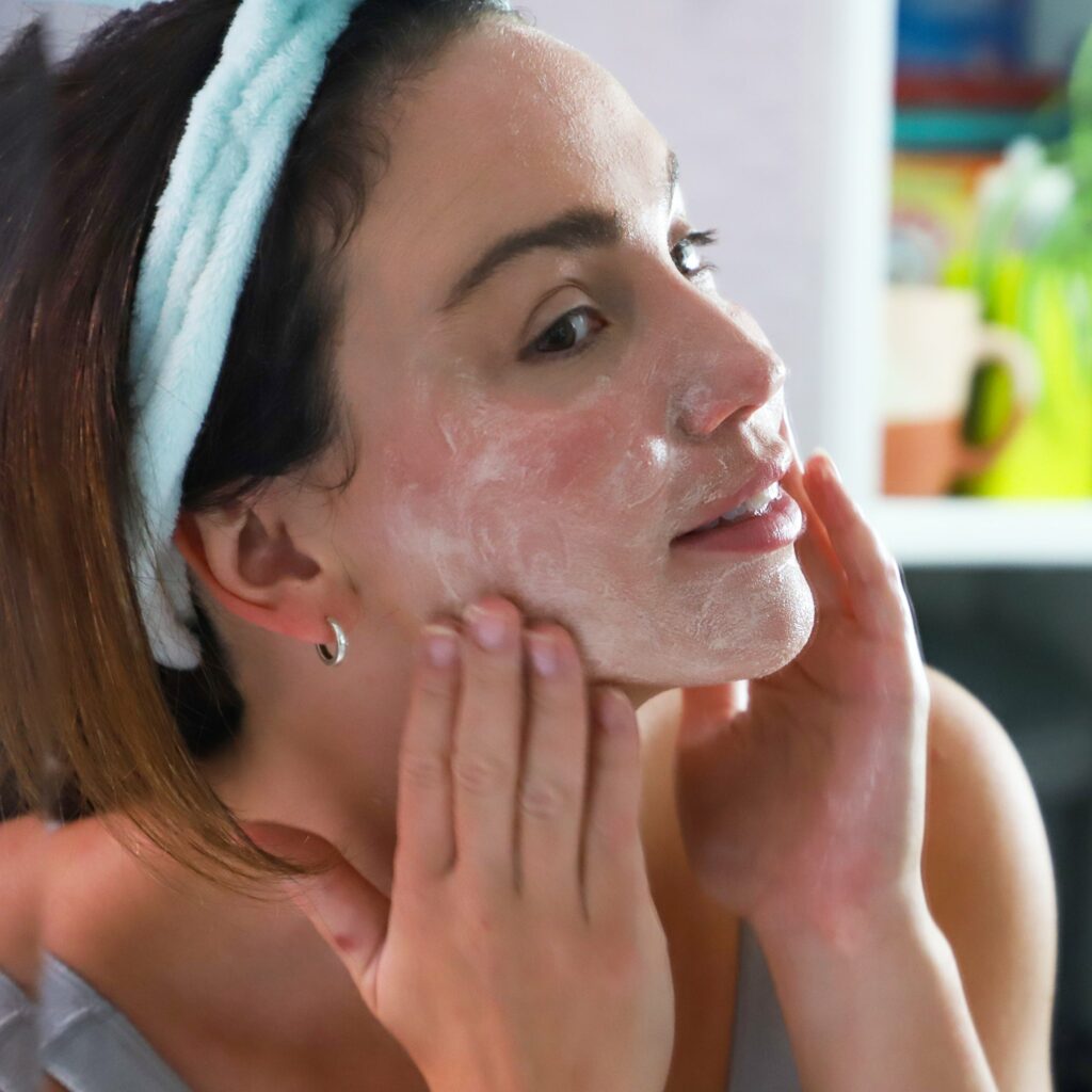 skincare trends woman washing face
