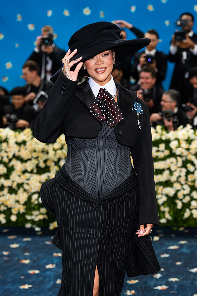 Met Gala Red Carpet Rhianna tipping hat 