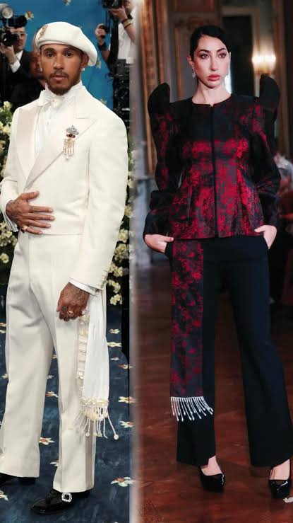 Met Gala 2025 man in white suit and woman ion pants suit 