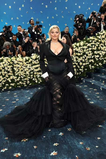 Met Gala 2025 woman in black dress with puffy train 