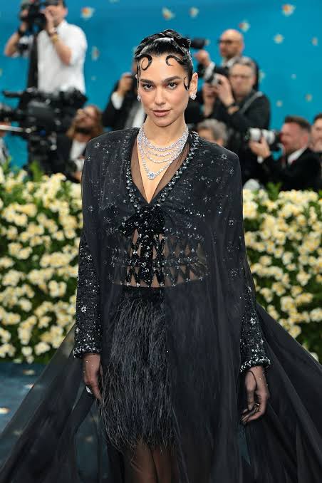 Met Gala 2025 black dress with twisted curls
