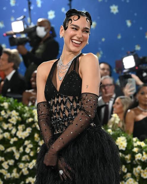 Met Gala 2025 red carpet girl laughing