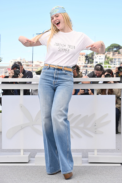 Cannes Film Festival Elle Fanning in Four Elegant Outfits white Tee shirt