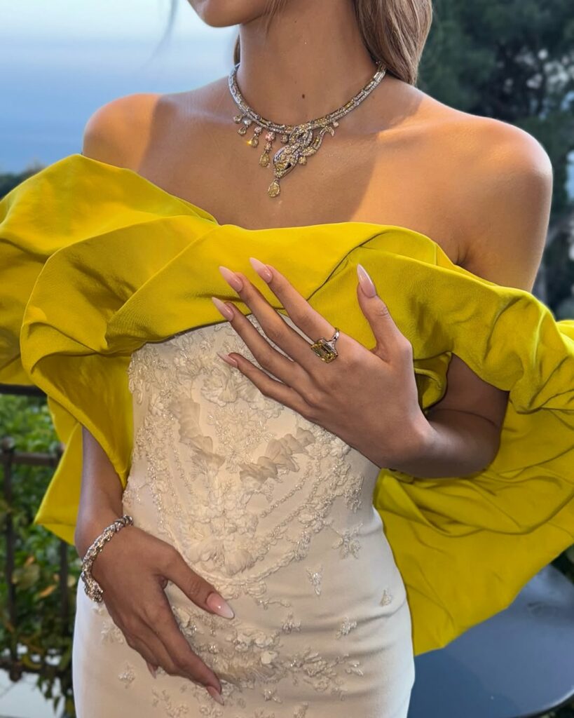 BLACKPINK Lisa Dazzles in white dress with yellow traimn at Krikor Jabotian Chapter XII 