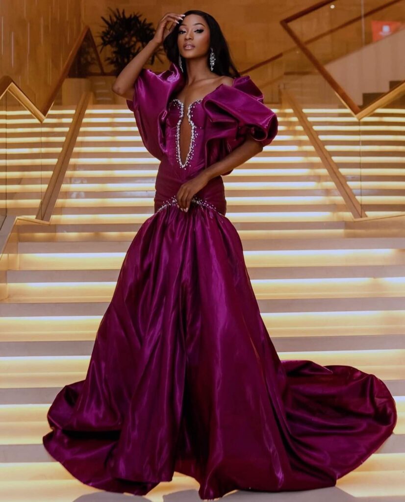 Faith Bwalya in purple dress