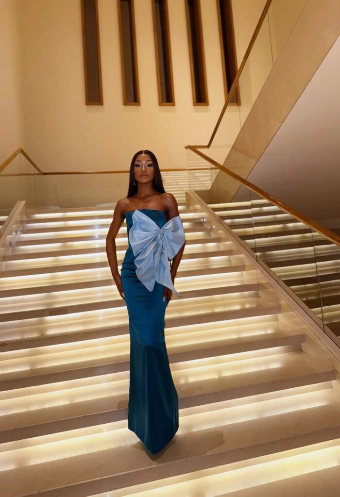 Faith Bwalya in blue dress