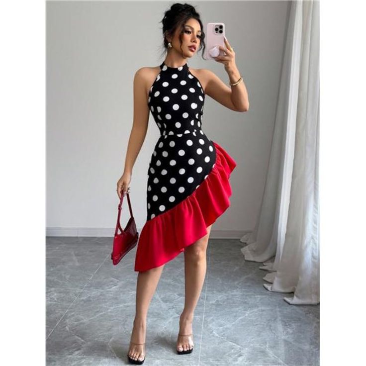 Woman in polka dot asymmetrical silhouettes