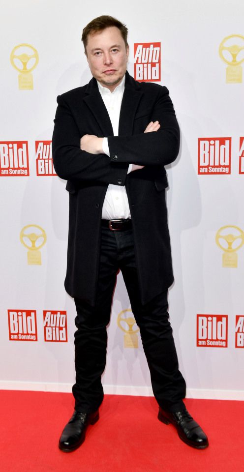 Elon Musk in black suit