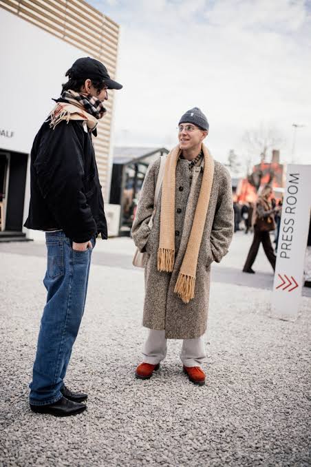 Two men wearing carves at Pitti Uomo 2025