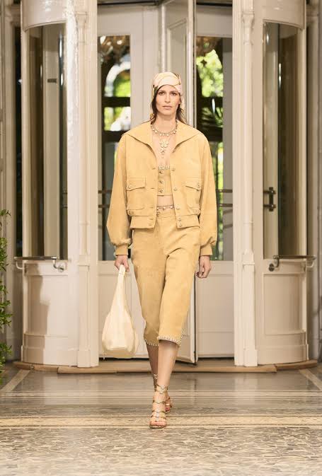 Model wearing yellow denim